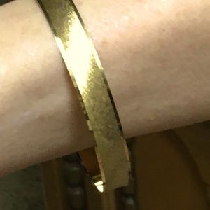 Vintage Gold Tone Bracelet With Satin Inner Band and Shiny Outer Rims.